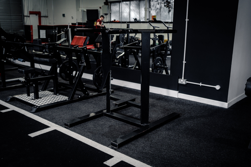 Plate-loaded machines and free weights area at Strength Factory, Westhoughton