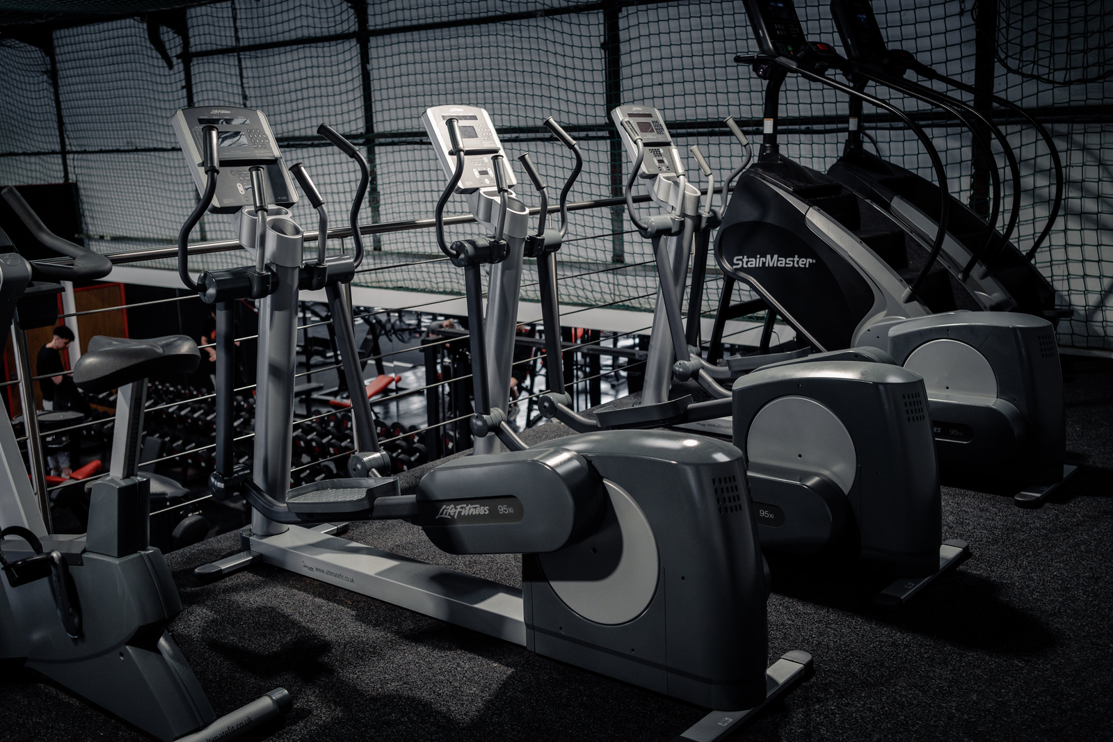 Cross trainers and StairMaster in the cardio area at Strength Factory, Westhoughton