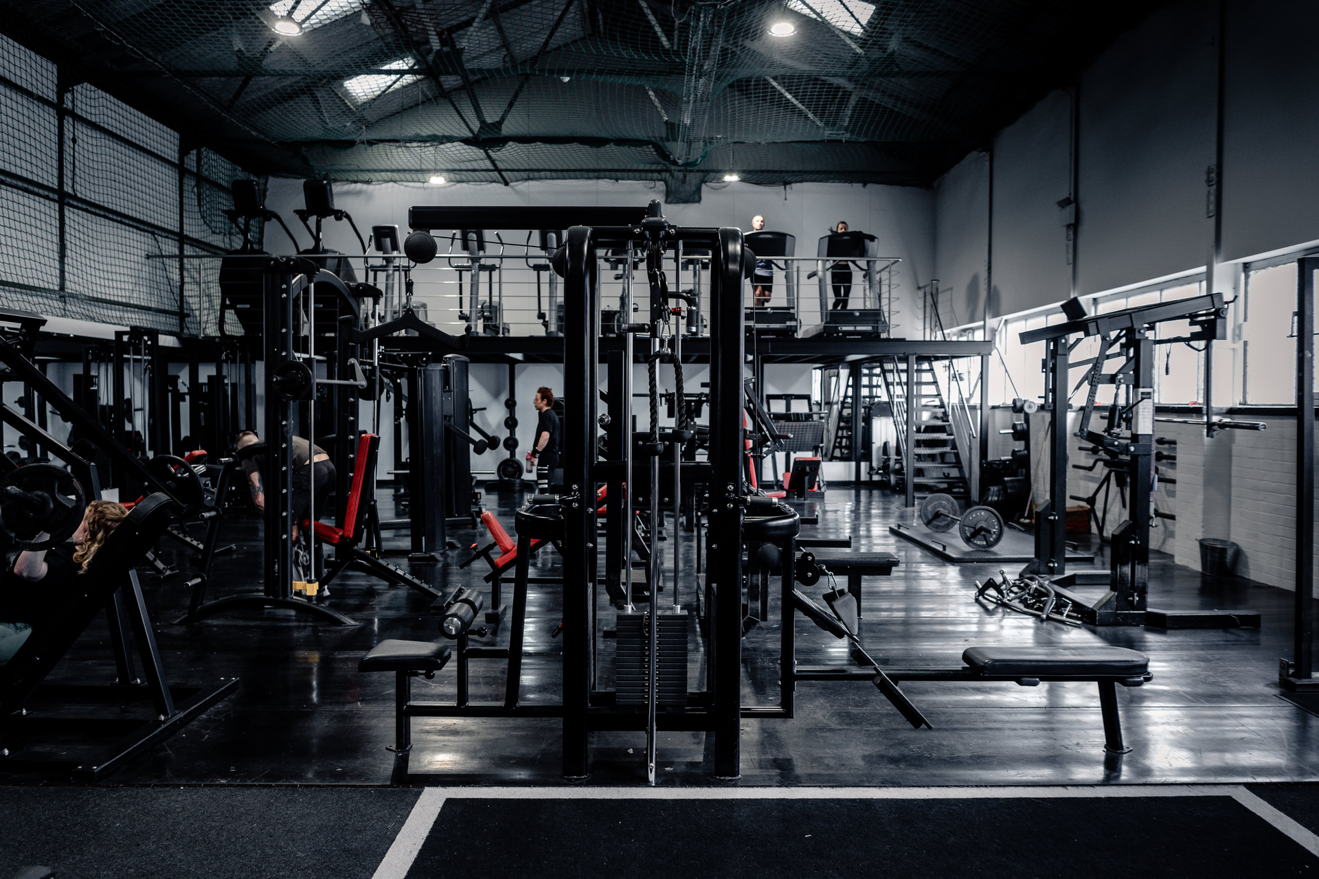 Wide view down the main training floor at Strength Factory gym in Westhoughton, Bolton