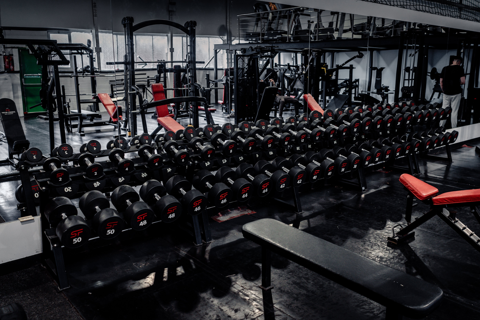 Strength Factory branded dumbbells on the rack, with benches, in Westhoughton
