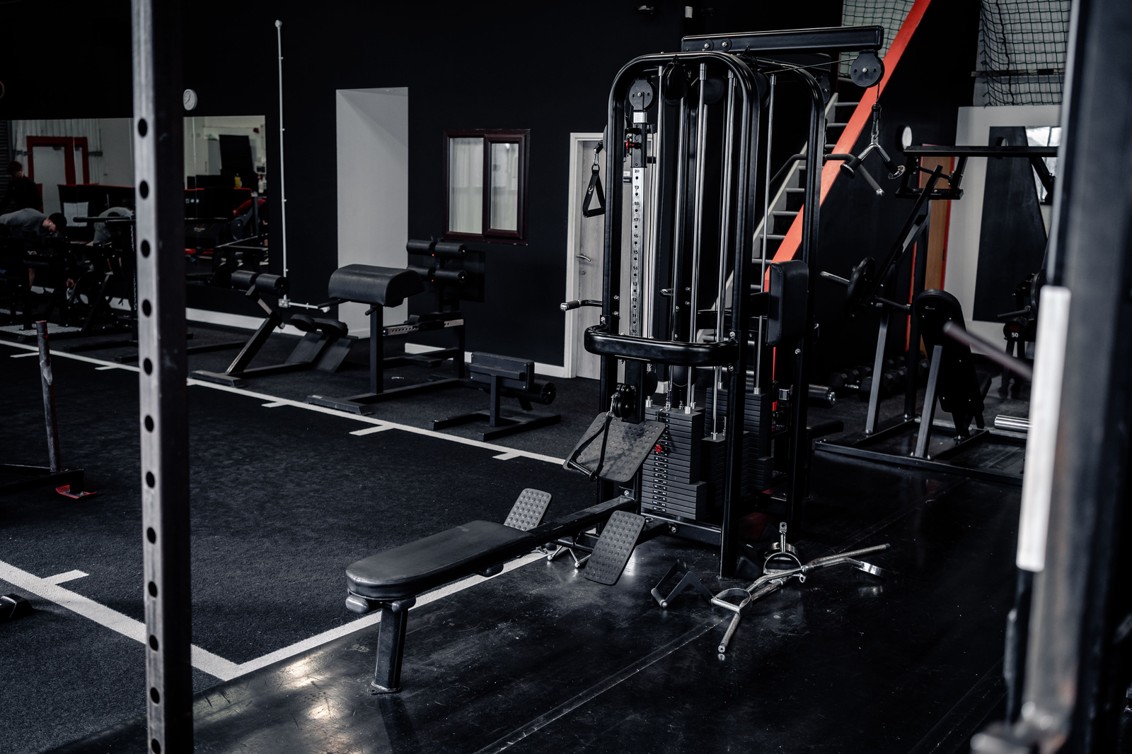 Cable stations, benches and machines across the training floor at Strength Factory